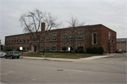 427 W. Jackson St., a Late Gothic Revival elementary, middle, jr.high, or high, built in Port Washington, Wisconsin in 1931.