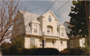 1050 SHERMAN AVE, a Dutch Colonial Revival house, built in Madison, Wisconsin in 1902.