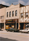 114 N MAIN ST, a Commercial Vernacular small retail building, built in Oconomowoc, Wisconsin in 1891.