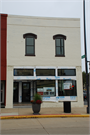242 E MAIN ST, a Commercial Vernacular small retail building, built in Sun Prairie, Wisconsin in 1889.