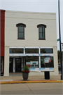 242 E MAIN ST, a Commercial Vernacular retail building, built in Sun Prairie, Wisconsin in 1889.