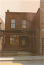 124 HIGH ST, a Commercial Vernacular small retail building, built in Mineral Point, Wisconsin in 1849.