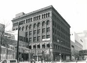 301 W WISCONSIN AVE, a Romanesque Revival retail building, built in Milwaukee, Wisconsin in 1892.