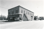 SE CORNER OF MAIN AND FRONT, a Commercial Vernacular theater/opera house/concert hall, built in Wild Rose, Wisconsin in 1902.
