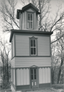 Huson, Henry H., House and Water Tower, a Building.