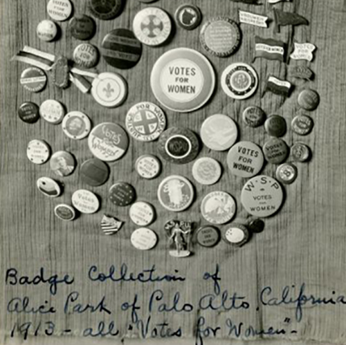 Several buttons are arranged in a circle, all with slogans, photographs, or symbols related to women's suffrage. Caption reads: Badge collection of Alice Park of Palo Alto, California, 1913 — all 'Votes for Women.'