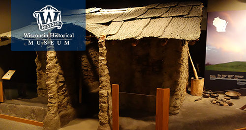 Wisconsin Historical Museum. A Museum exhibit of the Aztalan House, with stone pillars and a slate looking roof.