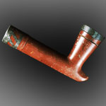 Catlinite pipe with lead inlay.
