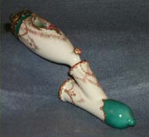 Pipe, porcelain, 2-pc, swags and festoons design, image of woman.