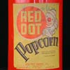 Red popcorn can featuring the Red Dot logo and cartoon of Ta-To the clown.
