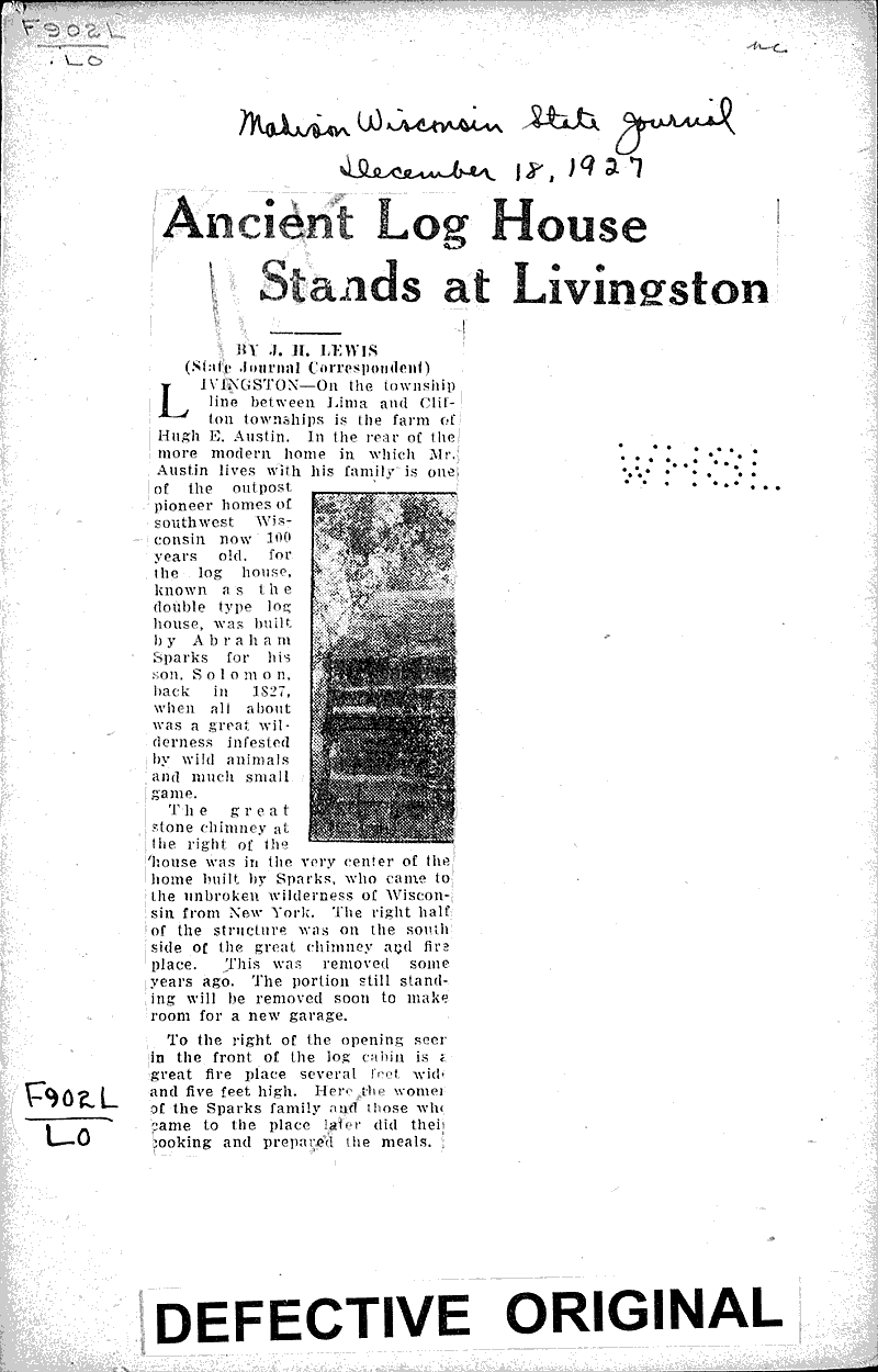 Ancient log house stands at Livingston Newspaper Article/Clipping